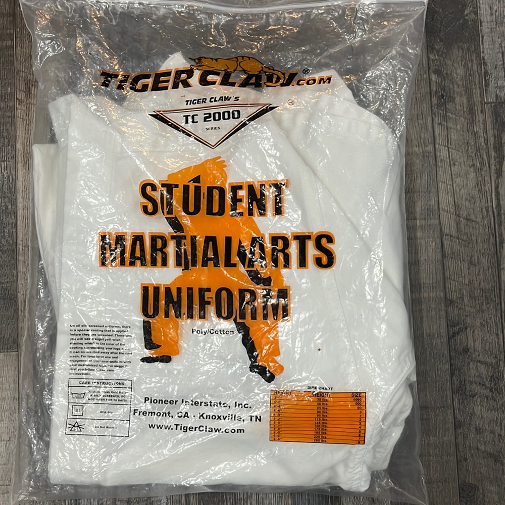 NWT karate suit with shirt, pants, and belt